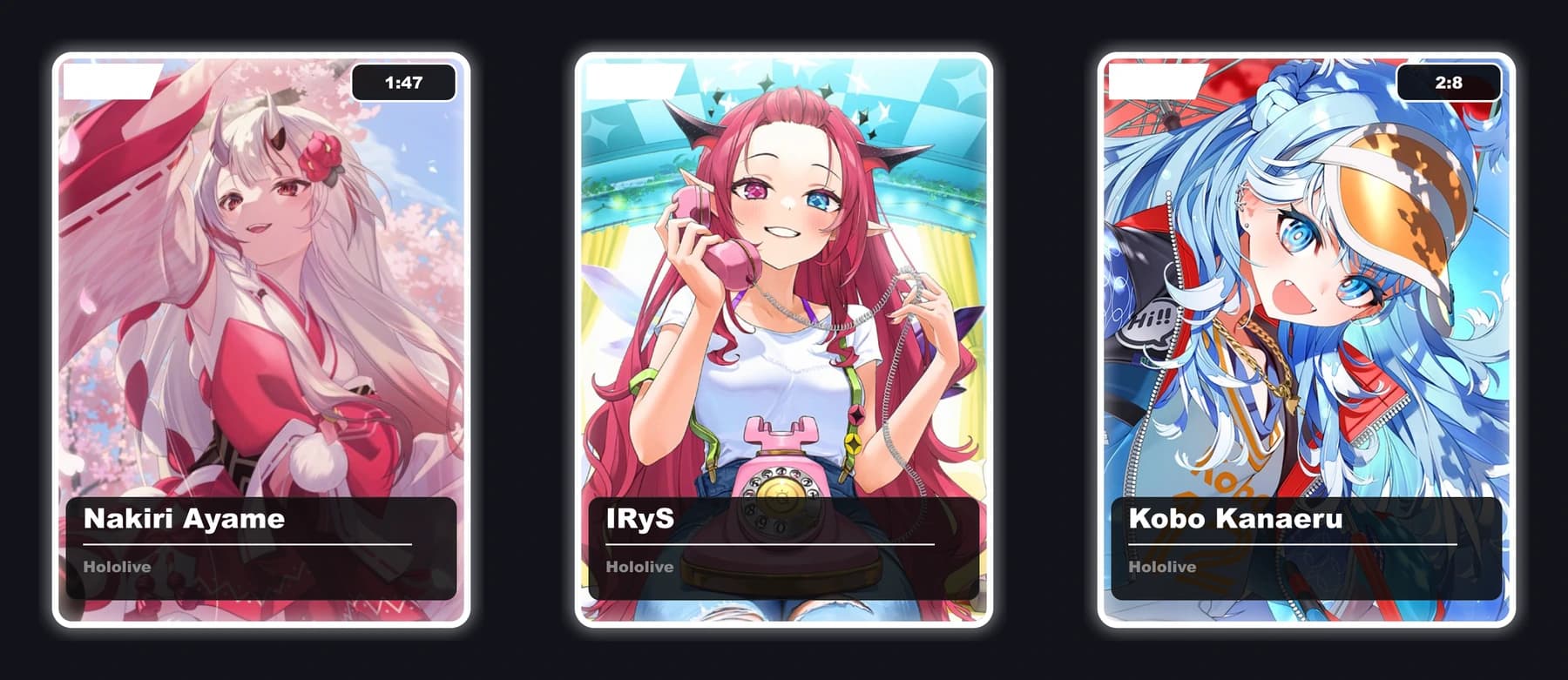 Three cards dropped side by side in plain white mystery frames